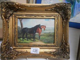 A gilt framed study of horses,