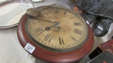 A circular wall clock marked W Mansell, Lincoln, COLLECT ONLY.
