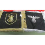 A German Third Reich pennant and one other.