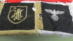 A German Third Reich pennant and one other.