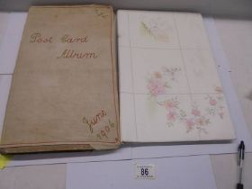 An album of approximately 150 early 20C postcards and a scrap book mainly relating to the Bronte's.