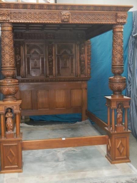 A large heavily carved mahogany bed in the design of The Great Bed of Ware, COLLECT ONLY. - Image 6 of 9
