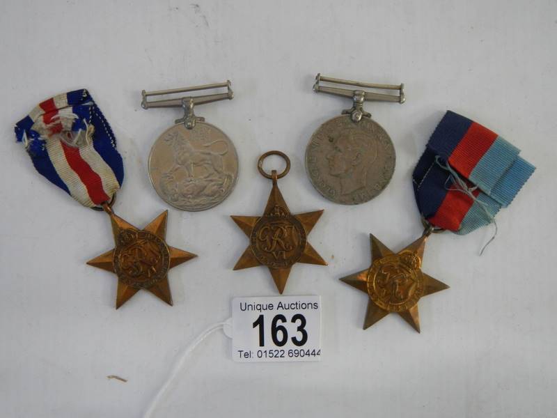 Five medals, The France & Germany Star, 2 x 1939-45 stars and two other medals. - Image 2 of 3
