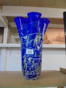 A tall overlaid cobalt blue art glass vase, height 35 cm.