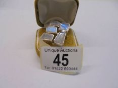A silver stone set ring, shank size M.