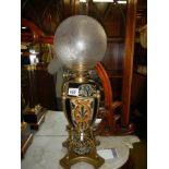 A good drop in font Doulton style oil lamp with Hinks burner and original shade. COLLECT ONLY.