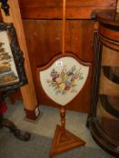 A Victorian pole screen with embroidered panel. COLLECT ONLY.