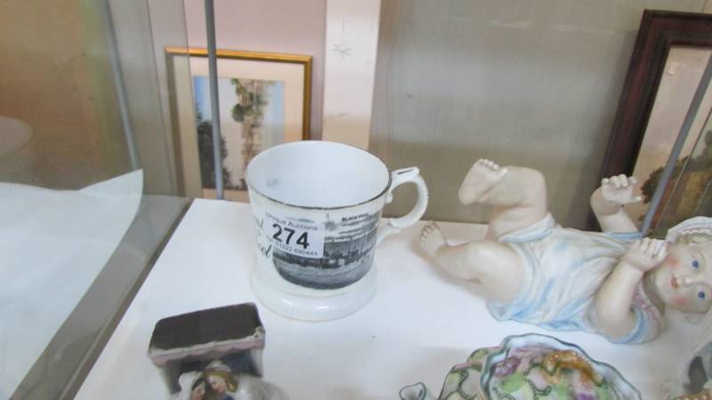 A mixed lot including piano baby, 2 Victorian fairings, small teapot and a Blackpool mug. - Image 3 of 4