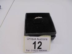 A five stone 18ct yellow gold ring, size N, 1.8 grams.