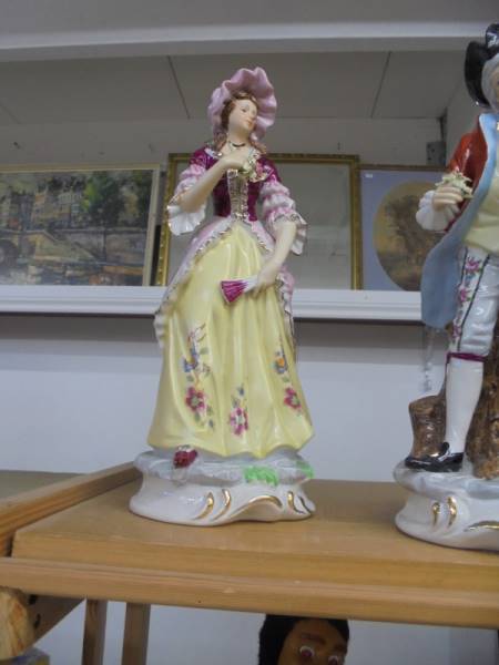 A pair of 19th century continental porcelain figures. - Image 3 of 3