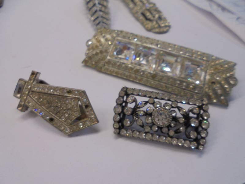 A quantity of paste clips and brooches, art deco in white metal, one stamped 'Kutiklip, ten in total - Image 6 of 6