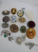 A mixed lot of good costume brooches, fifteen in total.