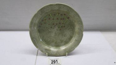 An unusual art pottery plate - possibly Chinese.
