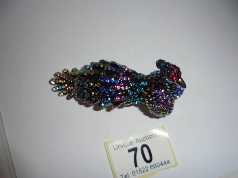 A stunning Butler & Wilson 3D peacock yellow metal ring set multicoloured crystals, 9cm long