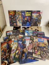 A collection of approximately 27 Lost in Space comics and a graphic novels, including a signed comic