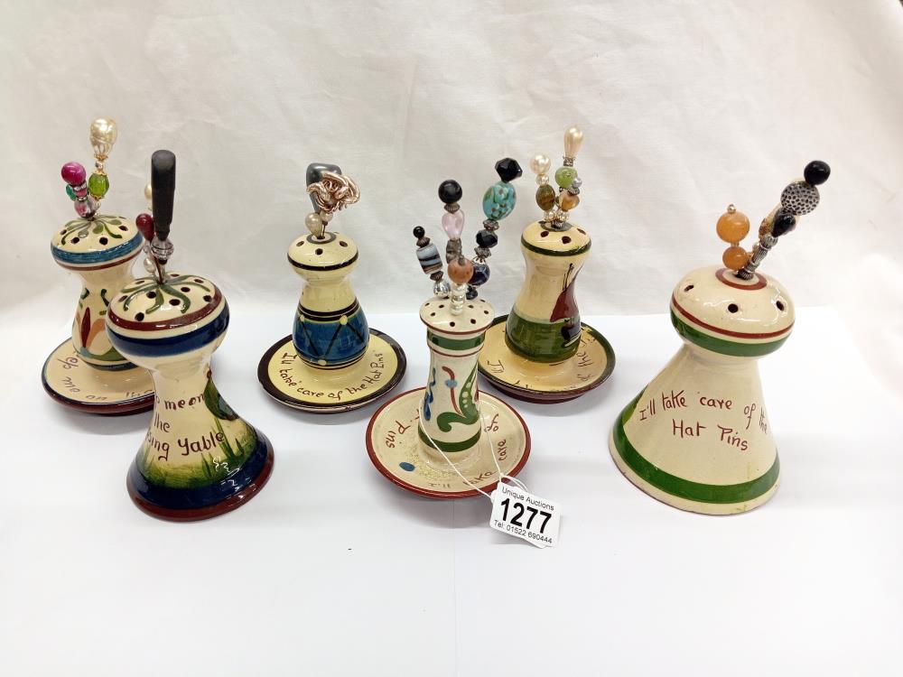 6 Devon pottery Torquay ware hat pin stands