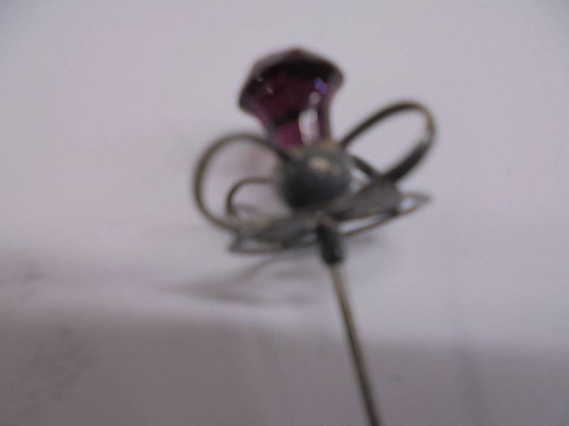 Four early 20th century silver hat pins. - Image 4 of 6