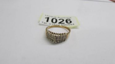 A white/yellow gold diamond ring, size Q, 2.49 grams.