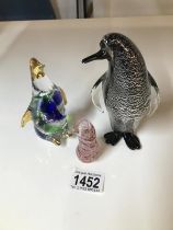 Two glass penguins & a sand filled penguin etc