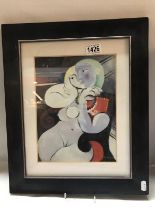 A framed and glazed print in the style of Picasso, COLLECT ONLY.