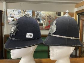 2 vintage police helmets with Lincoln City badges