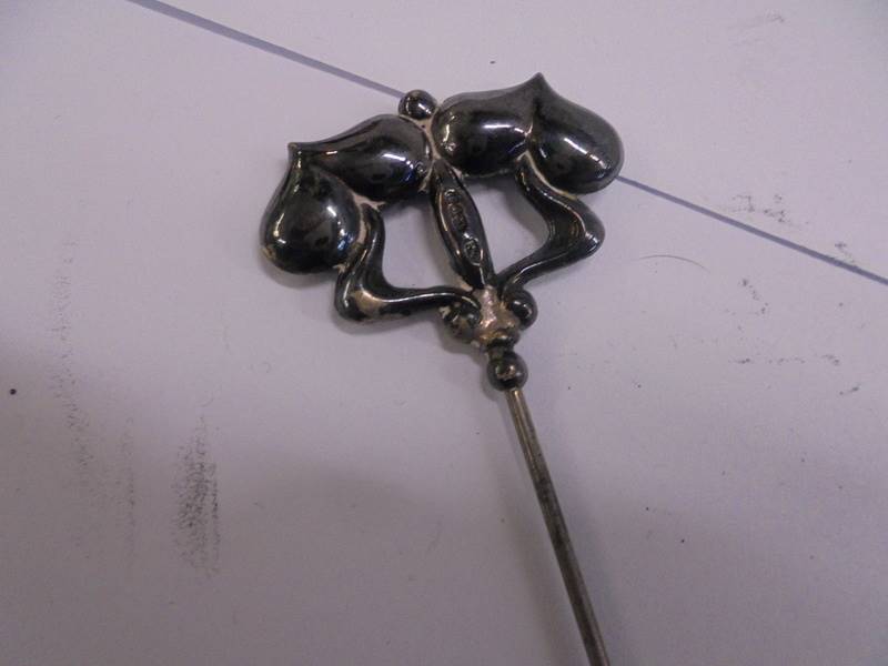 Four early 20th century silver hat pins. - Image 6 of 6