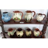 8 Torquay ware mid size puzzle jugs