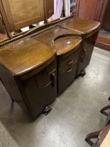 A 1930's oak sideboard