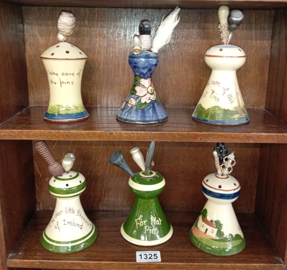 6 Torquay ware hat pin stands