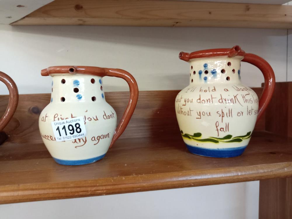 4 Torquay pottery puzzle jugs - Image 3 of 3