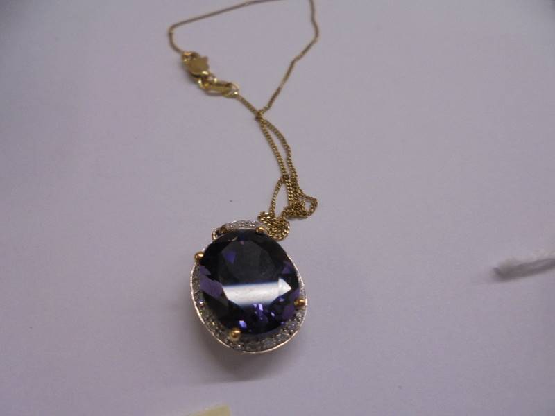 A 9ct gold ring set amethyst coloured stone, size O half with matching pendant, 7.25 grams total. - Image 3 of 3
