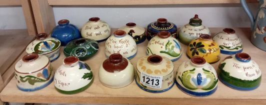 A good selection of Torquay pottery inkwells including C.H Brannum etc