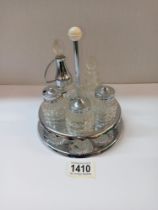 A silver plate cruet set