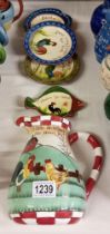 4 Torquay ware dishes & an unbranded jug wall pocket