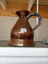 A large copper beer jug.