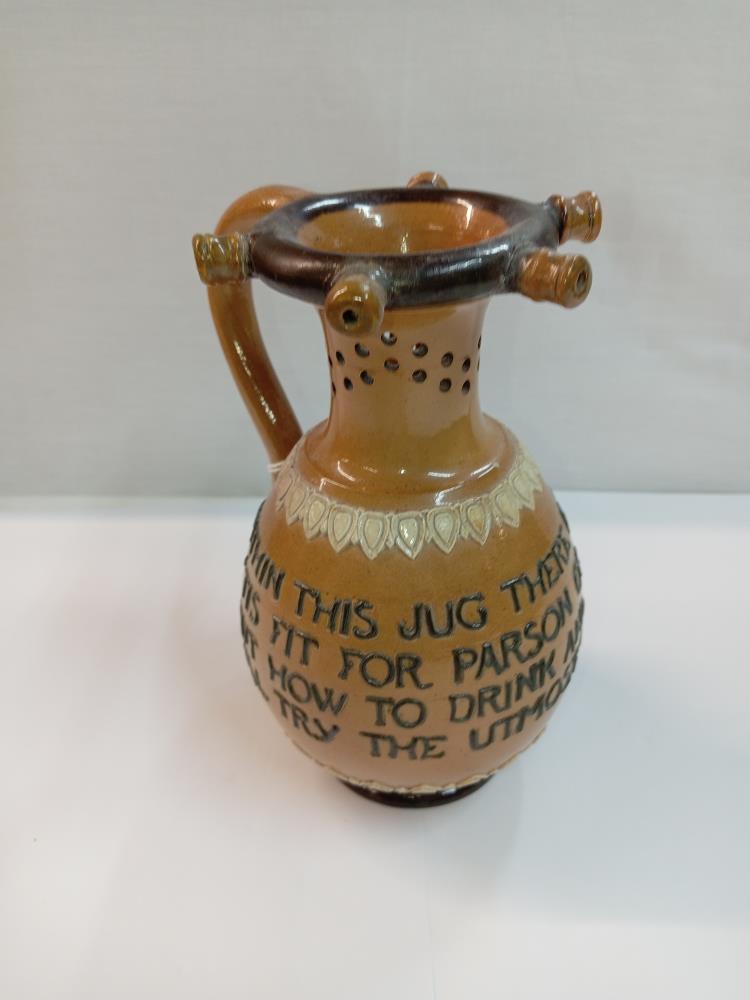 A Doulton Lambeth stoneware puzzle jug. Height 17cm. A/F - Image 3 of 8