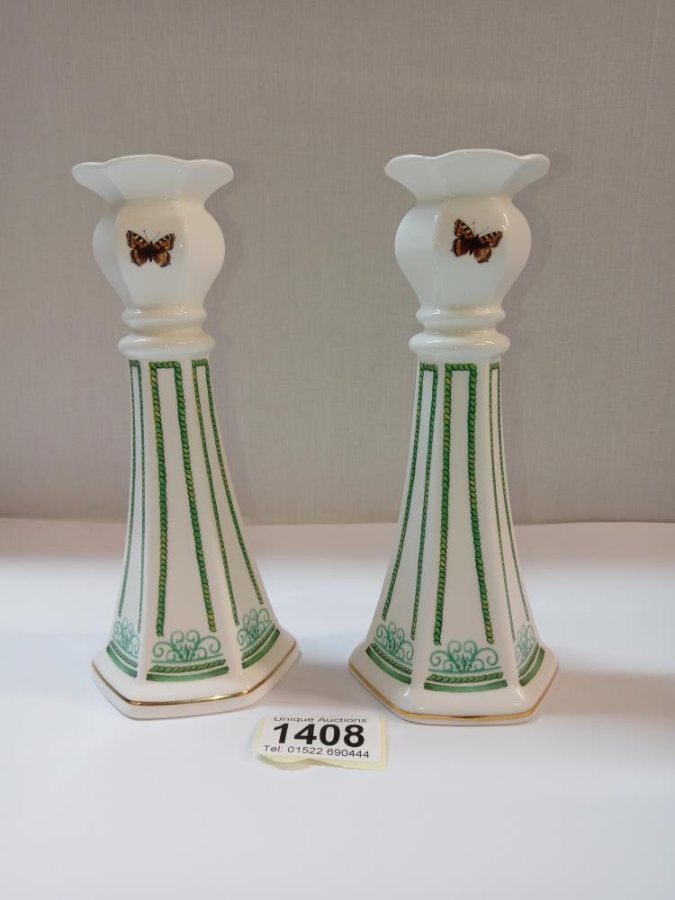 A pair of Aynsley candlesticks 'Victorian Gardens'