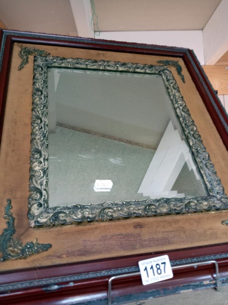 A Bevel edged mirror in a wood and metal frame. - Image 2 of 2