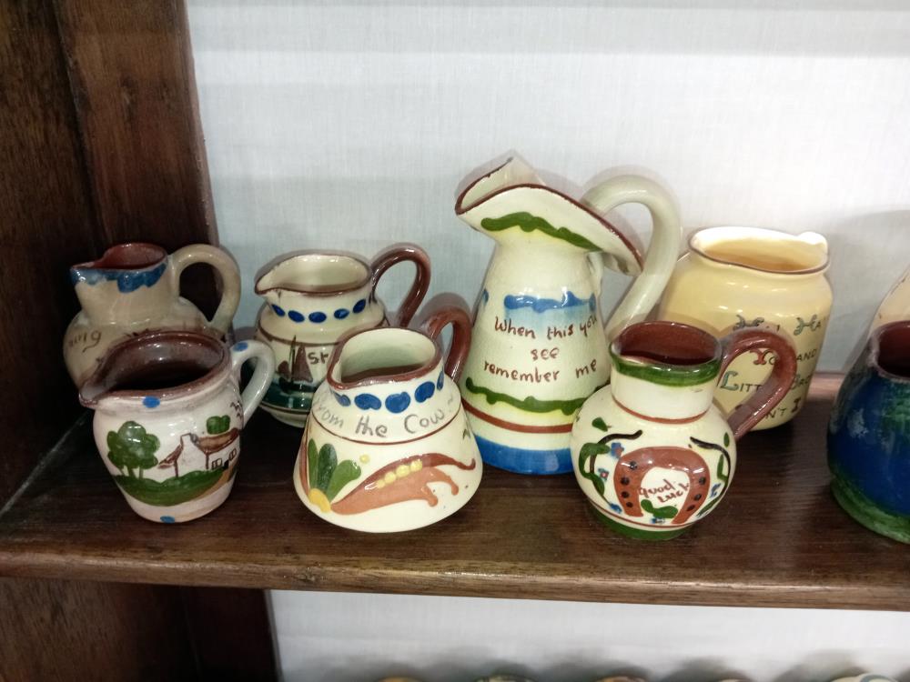 13 Torquay ware small jugs - Image 2 of 3