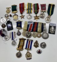 A mixed lot of 20th century medals etc.,