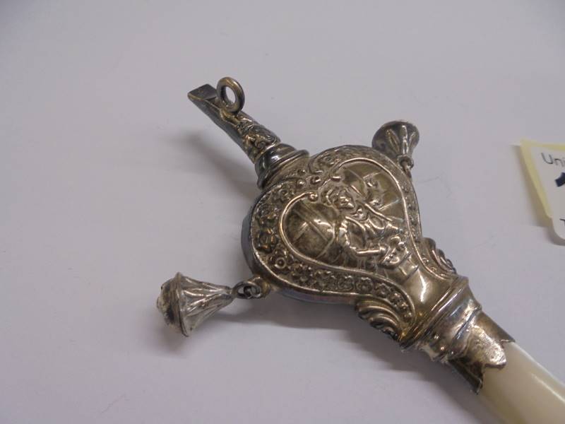 A 19th century silver and mother of pearl rattle with bells and whistle. - Image 3 of 3