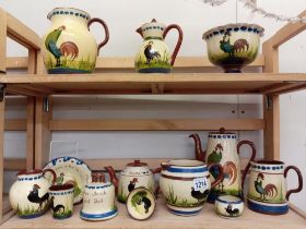 A good selection of chicken decorated pottery, 2 shelves