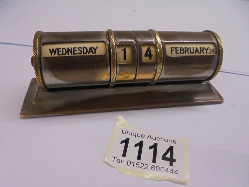 A silver perpetual desk calendar and a brass example. - Image 3 of 3
