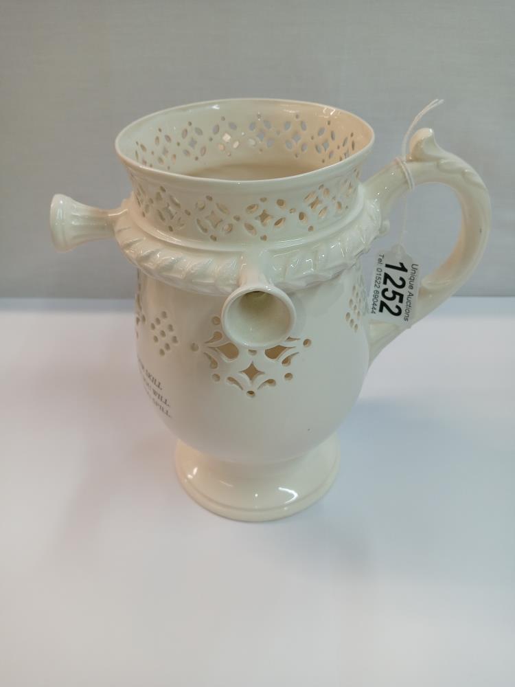 A Leedsware classical creamware puzzle jug. Height 20cm