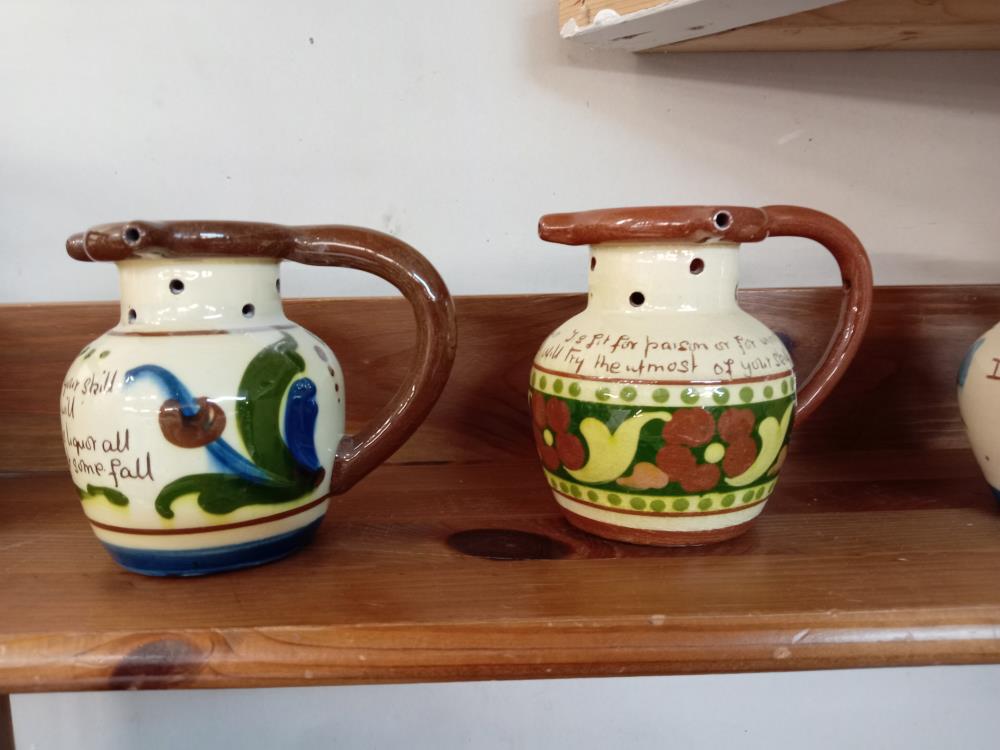4 Torquay pottery puzzle jugs - Image 2 of 3