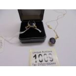 A 9ct gold ring set amethyst coloured stone, size O half with matching pendant, 7.25 grams total.