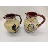 2 Torquay ware puzzle jugs including Watcombe pottery