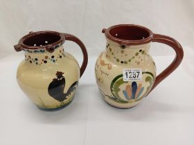 2 Torquay ware puzzle jugs including Watcombe pottery