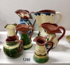 7 unbranded Torquay ware jugs