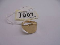 A 9ct gold gents signet ring, size R, 6.81 grams.